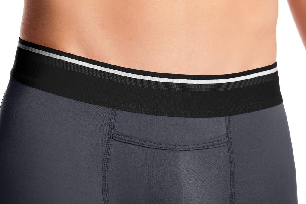 We believe that minimalism speaks volumes over loud branding. This lead us to design an understated waistband with a white and textured stripe layered on top of a classic black.